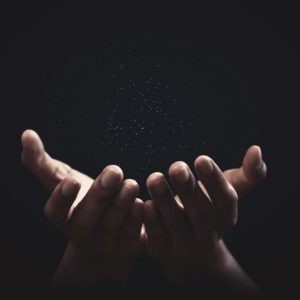 Praying hands with faith in religion and belief in God on blessing background. Power of hope or love and devotion.